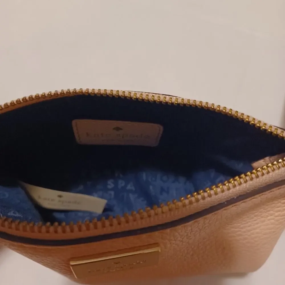 Kate Spade New York Pink Tone Wristlet.